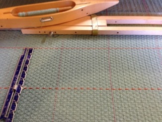 Contrasting warp and weft yarns as dividers